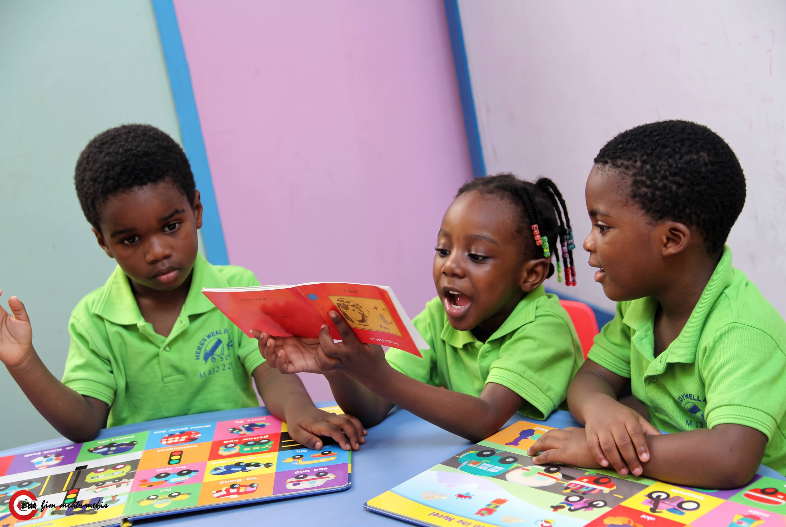 Honeywell School pupils reading together in their classroom